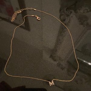 M gold necklace